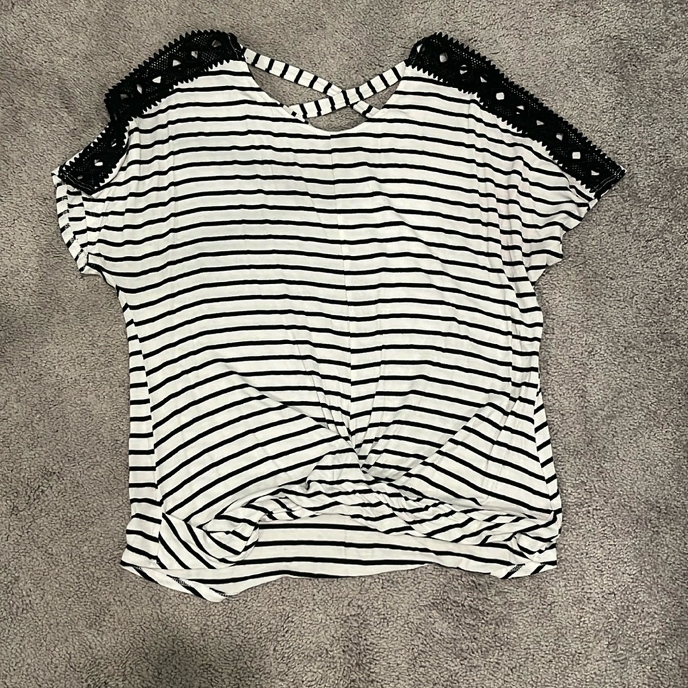Striped top with decorative sleeves and criss cross cut out back